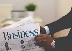 Businessman reading business paper
